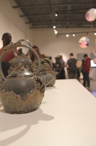 Senior Alyssa Wanner's piece, "Submarine Teapots," was one of the many artworks displayed in the University Gallery April 24. 