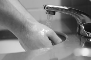 College students are particularly susceptible to illness, such as colds and the flu, due to a large number of people living close together, high stress levels and a lack of sleep. Washing hands frequently can help prevent illness. Photo illustration by Jesse Major.
