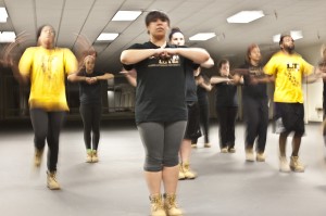 First-year Brittanya Love practices with PLU’s step team Lute Nation Tuesday evening in the Columbia Center. A minor heart murmur prevented Love from being able to practice with the team at the start of the school year. Photo by Emily Jacka