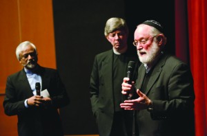 Imam Jahmal Rahman (left), Pastor Don Mackenzie (middle) and Rabbi Ted Falcon (right) discuss the five stages of interfaith dialogue Wednesday evening in the Phillips Center.