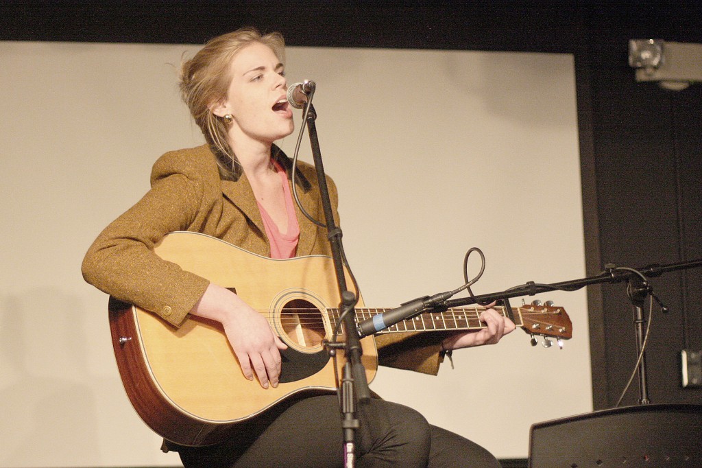 Senior Olivia McLaughlin performs at the Powerful Women in Performance event in The Cave March 14. The event celebrated powerful women at PLU and featured singing, fiddling, spoken word poetry and visual arts.