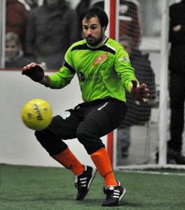 PLU alum Andrew Croft saves a ball during an indoor soccer match this year. Photo courtesy of Jeff Halstead.