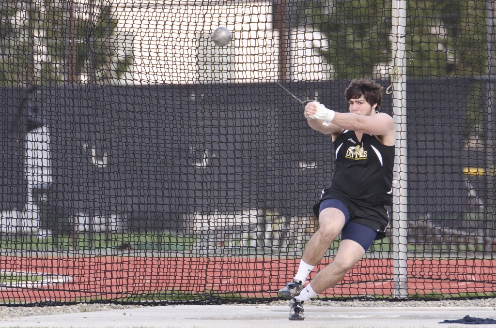 Senior Matt VanEaton powers through a throw on his way to a personal best mark. Photo by Jesse Major