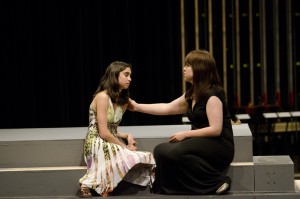 Assistant stage manager and junior Catherine Brassey (left) rehearses a scene from “Macbeth” with sophomore Jessi Marlow (right), who plays Lady MacDuff. Photo by Jesse Major.