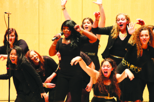  HERmonic members sing the song “Break Free” by Ariana Grande. Both groups performed Oct. 29 in Lagerquist Concert Hall. Photo: Michael Diambri