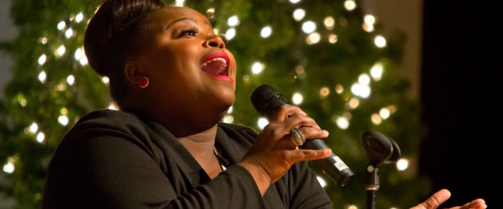 Crystal Aikin performing at a holiday luncheon in December 2013 (John Froschauer). 