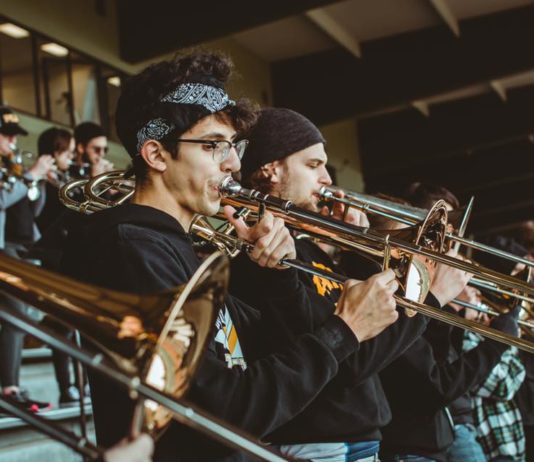 Pep band brings the hype to football season The PLU Pep Band plays at a football game.